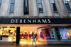 Debenhams has recorded flat like-for-likes in its third quarter as sales were hit by the unseasonably cold weather