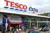 Tesco has put the brakes on new large developments in order to conserve cash and reflect changing shopping habits.