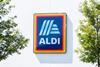 Aldi sign on white wall