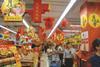 China’s second largest grocer, China Resources Enterprise (CRE), has posted its first full-year loss for more than a decade as tough market conditions begin to bite.