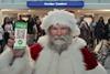 Tesco Christmas ad still showing Santa at border control with a Covid-19 passport app