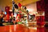 Pint of beer on a pub bar