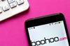 Boohoo-site-on-smartphone-next-to-keyboard