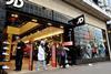 JD Sports Fashion's pre-tax profits before exceptionals jumped from £2.9m to £10m in its half year as its sports fascia earnings soared.