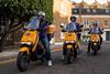 Three Getir delivery riders on a UK street