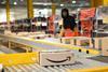 Amazon Warehouse with parcel on conveyorbelt