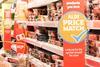 Aldi Price Match sign on Sainsbury's shelves