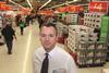 Asda boss Andy Clarke says Asda would need to reflect the costs of doing business in Scotland