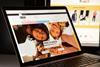 ASOS website homepage on laptop