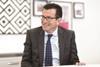 Carpetright boss Wilf Walsh has slammed the Government’s decision to abolish the uniform business rate and devolve powers to local authorities.