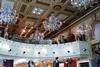 The Forever 21 store was previously a bank and boasts a dramatic mezzanine with multiple chandeliers for glitz