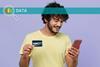 Man holding phone and credit card