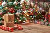 Packages in front of a Christmas tree