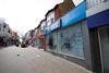 The number of stores shuttered across Britain jumped in the first half of 2012