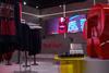 Interior of Red Run store, Liverpool One, showing a screen and products on display
