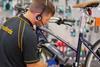 Halfords employee fixing an electric bike
