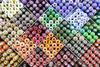 Multicoloured rolls of fabric
