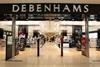 Debenhams boss Michael Sharp has dismissed suggestions that shareholder unrest sparked his impending exit from the retailer.