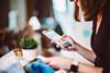 Woman online shopping on her smartphone