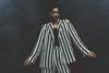 Female model wearing suit from Colleen Atwood Collection