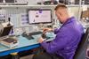 currys-repair-apple-phone-close-up-colleague-2