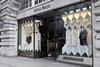 Formal menswear retailer Moss Bros first half sales increased but profits slipped as it temporarily closed stores to refit them.