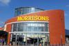 Morrisons pre-tax profit plunged 22.1% to £344m in its first half as it blamed challenging market conditions.