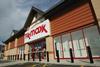 The parent company of TK Maxx and HomeSense is to slow its pace of growth in Europe in a bid to get back on track after a 52% fall in full year profits.