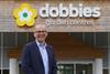Dobbies CEO David Robinson outside a garden centre