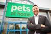 Peter Pritchard in front of a Pets At Home store