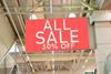 Half price sale sign in store