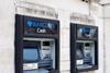Two ATMs with Barclays logo above