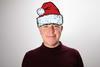 George MacDonald wearing santa hat
