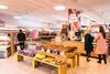 The store has been refitted with wooden floors and bright, colourful signage to create a much more modern shopping environment.