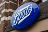 Boots logo on sign shown from street