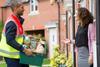 Woman accepts delivery from Tesco on her doorstep
