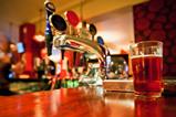 Pint of beer on a pub bar