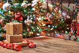 Packages in front of a Christmas tree