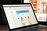 H&M website on laptop screen