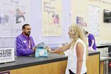 Customer and colleague in Currys store