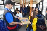 Customers receiving their Domino's orders on the number22 bus in Blackpool