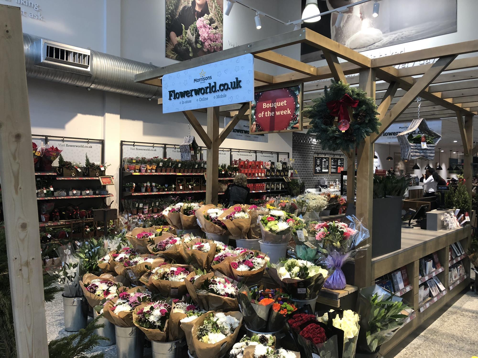 Store gallery Morrisons opens first 'food market court' Photo