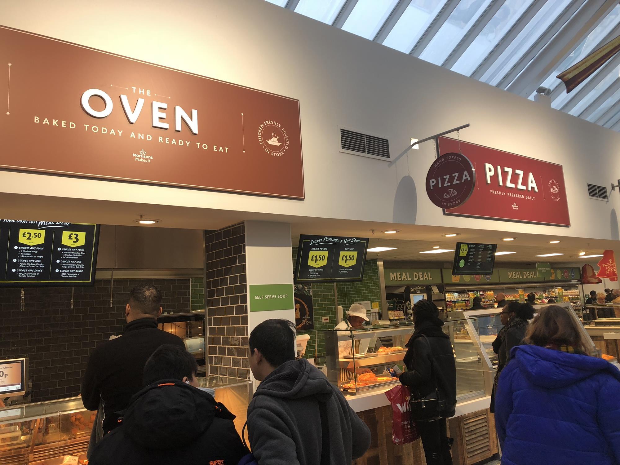 Store gallery Morrisons opens first 'food market court' Photo