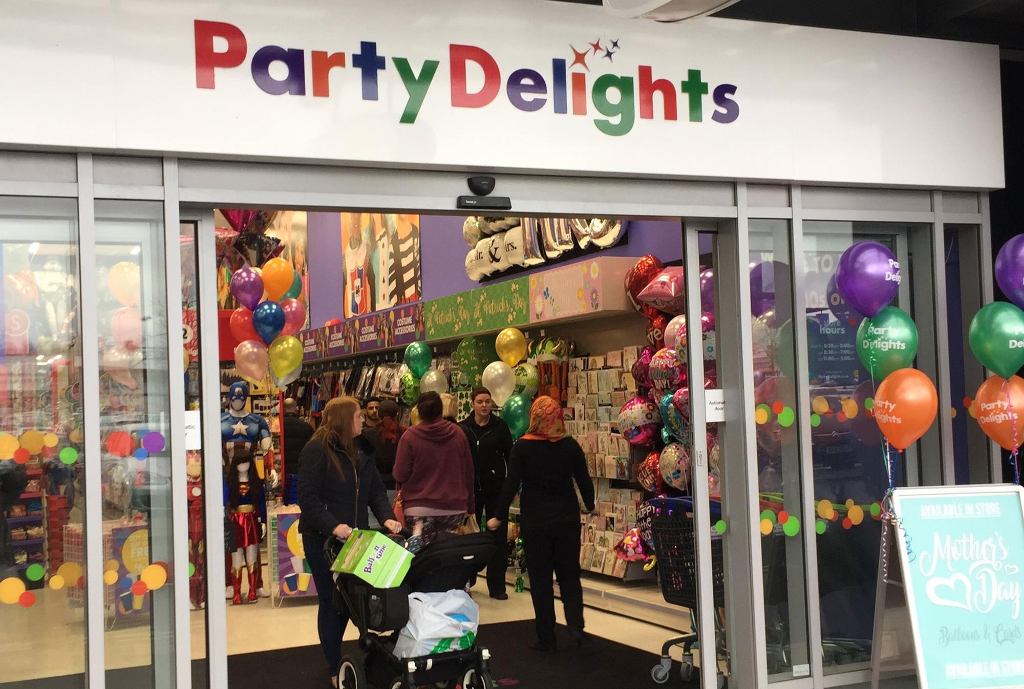 Clintons pops the cork on new fascia Party Delights News