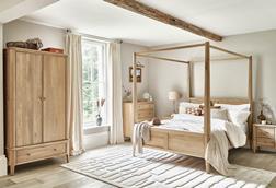 Oak Furnitureland Newton four-poster bedroom