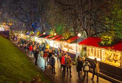 Shoppers in an outdoor Christmas market