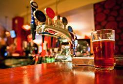 Pint of beer on a pub bar