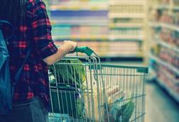 Consumer with shopping trolley