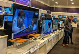 TVs on display in electricals store