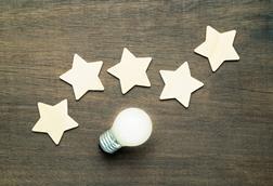 Five stars and idea lightbulb